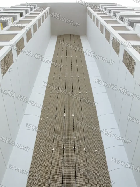 Facade-length grating cladding on a building skylight