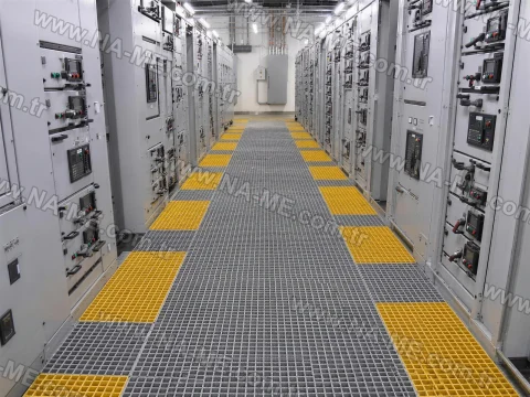 FRP grating walkway in an electrical panel corridor