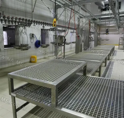 Grating platform with stainless legs in a meat plant