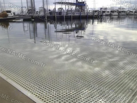 White FRP grating decking on a marina dock