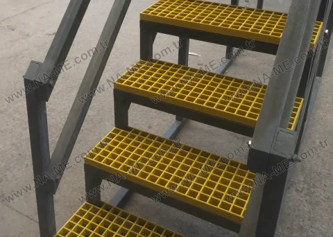 Yellow grating stair treads on steel-frame stairs