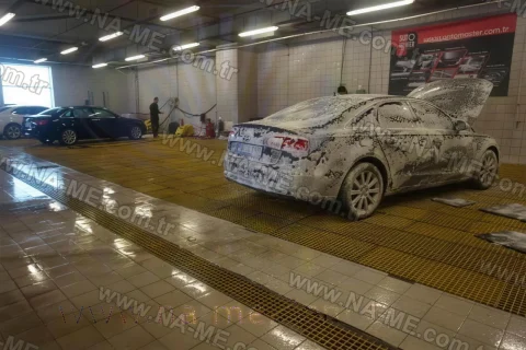 Yellow FRP grating floor in a car wash area