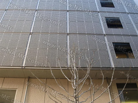 Perforated architectural screen on a building facade