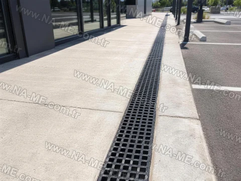 Outdoor polymer concrete channel installation