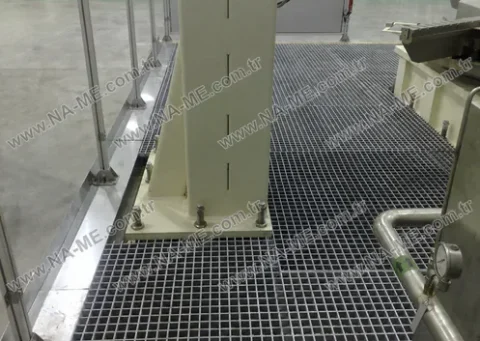 Grey grating platform around a column