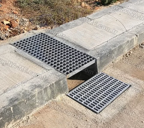 FRP trench grating set into a sidewalk edge