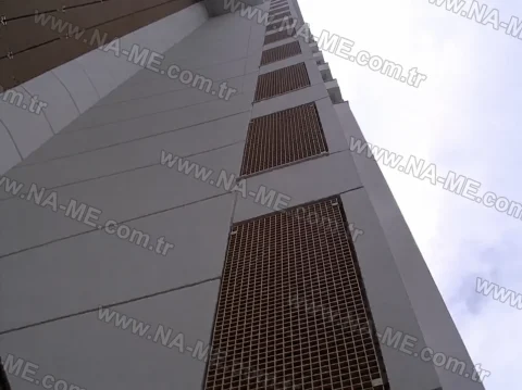 Grating ventilation panels on a high-rise facade