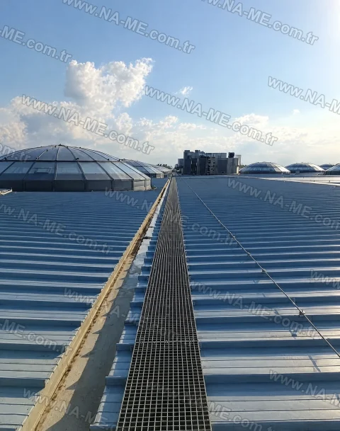 Ridge walkway running past roof skylights