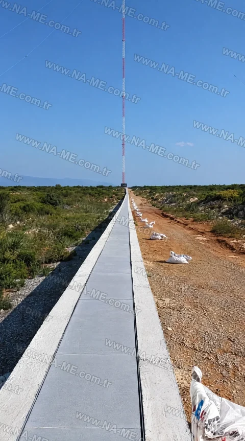 Long run of cable trench covers across open ground